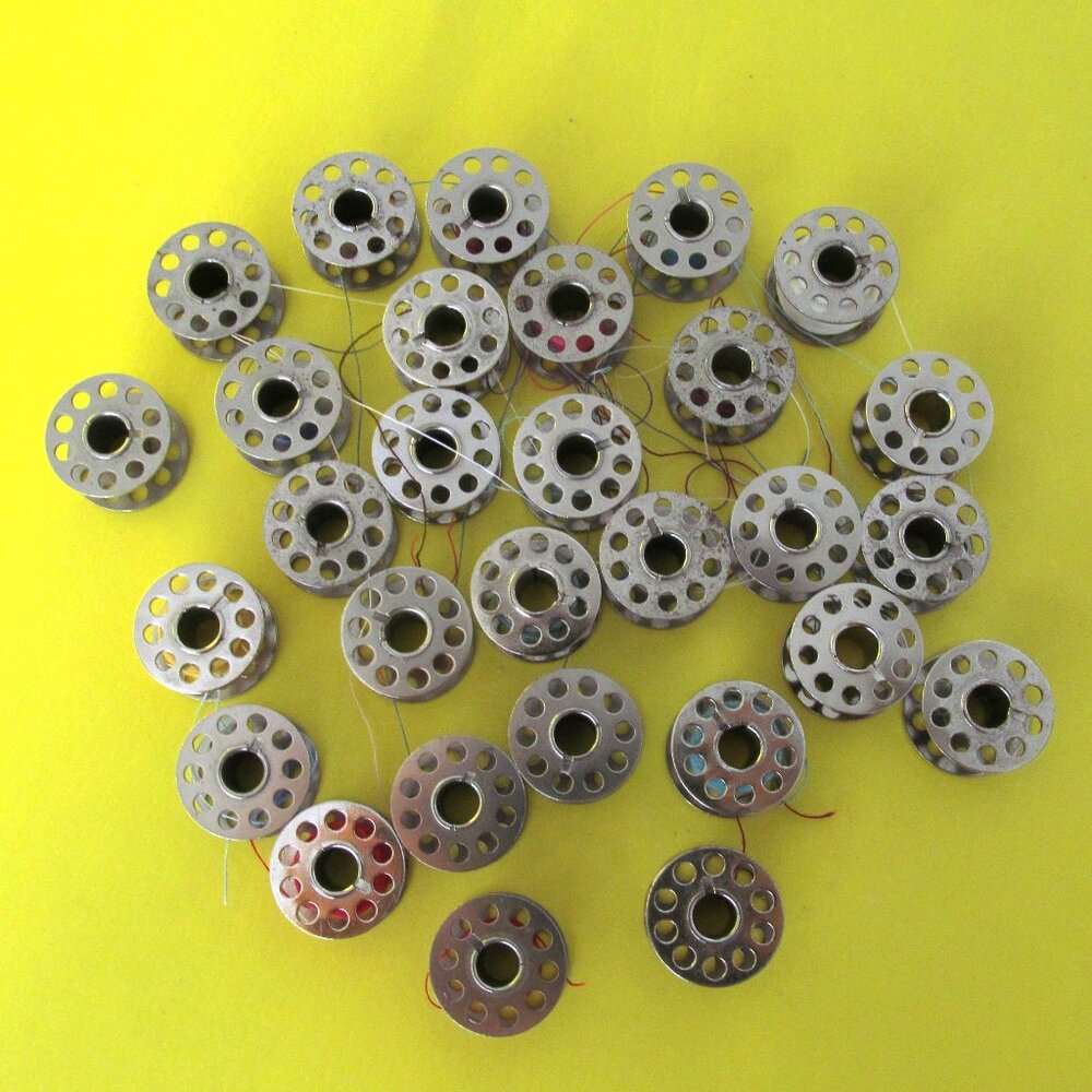 Metal sewing machine bobbin lot # 1